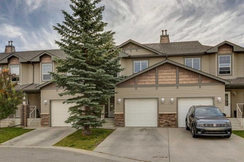 51 Spring Meadows Bay, Okotoks, AB - Outdoor With Facade