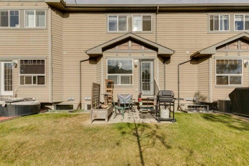51 Spring Meadows Bay, Okotoks, AB - Outdoor With Exterior