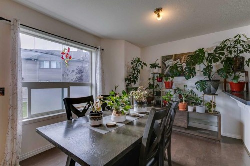 51 Spring Meadows Bay, Okotoks, AB - Indoor Photo Showing Dining Room
