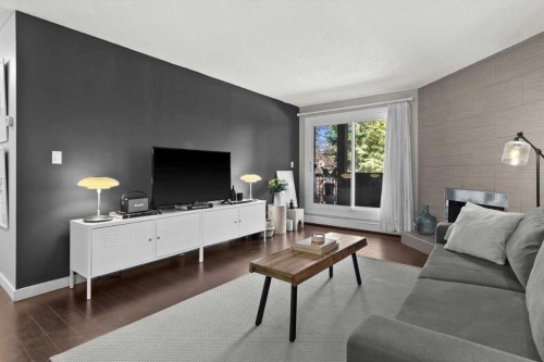 205-1001 68 Avenue Sw, Calgary, AB - Indoor Photo Showing Living Room