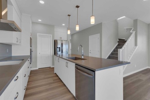 69 Silver Spruce Road Sw, Calgary, AB - Indoor Photo Showing Kitchen With Stainless Steel Kitchen With Upgraded Kitchen