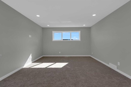 69 Silver Spruce Road Sw, Calgary, AB - Indoor Photo Showing Other Room