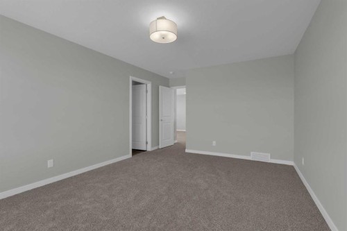 69 Silver Spruce Road Sw, Calgary, AB - Indoor Photo Showing Other Room