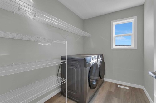 69 Silver Spruce Road Sw, Calgary, AB - Indoor Photo Showing Laundry Room