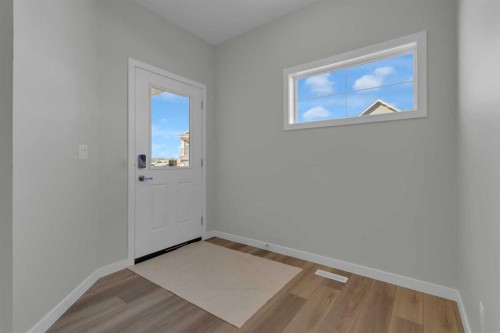 69 Silver Spruce Road Sw, Calgary, AB - Indoor Photo Showing Other Room