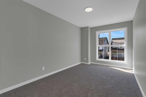 69 Silver Spruce Road Sw, Calgary, AB - Indoor Photo Showing Other Room