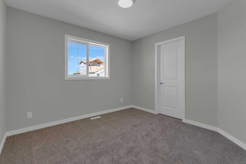 69 Silver Spruce Road Sw, Calgary, AB - Indoor Photo Showing Other Room