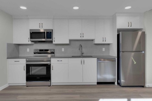 69 Silver Spruce Road Sw, Calgary, AB - Indoor Photo Showing Kitchen With Stainless Steel Kitchen