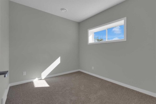 69 Silver Spruce Road Sw, Calgary, AB - Indoor Photo Showing Other Room