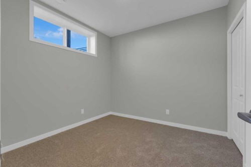 69 Silver Spruce Road Sw, Calgary, AB - Indoor Photo Showing Other Room