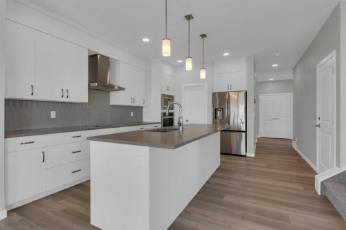 69 Silver Spruce Road Sw, Calgary, AB - Indoor Photo Showing Kitchen With Upgraded Kitchen