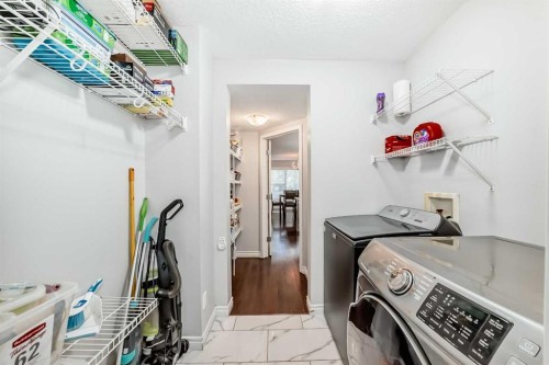 574 Chaparral Drive Se, Calgary, AB - Indoor Photo Showing Laundry Room