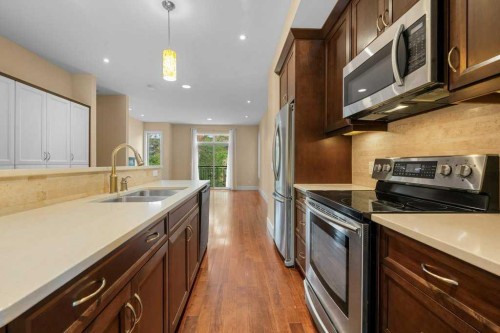 2512 16B Street Sw, Calgary, AB - Indoor Photo Showing Kitchen With Stainless Steel Kitchen With Double Sink