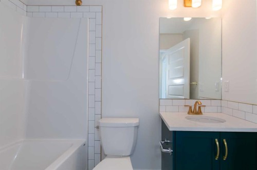 209-414 Seton Passage Se, Calgary, AB - Indoor Photo Showing Bathroom
