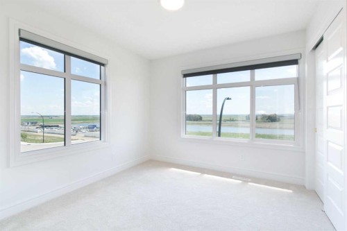 209-414 Seton Passage Se, Calgary, AB - Indoor Photo Showing Other Room