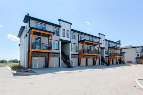 209-414 Seton Passage Se, Calgary, AB - Outdoor With Balcony