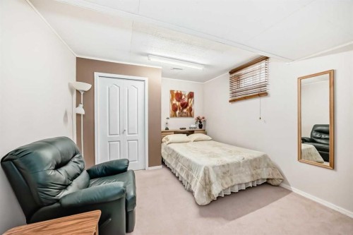 15 Whitewood Bay Ne, Calgary, AB - Indoor Photo Showing Bedroom