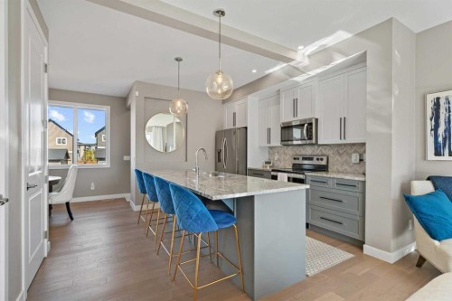 332 Lawthorn Way Se, Airdrie, AB - Indoor Photo Showing Kitchen With Upgraded Kitchen