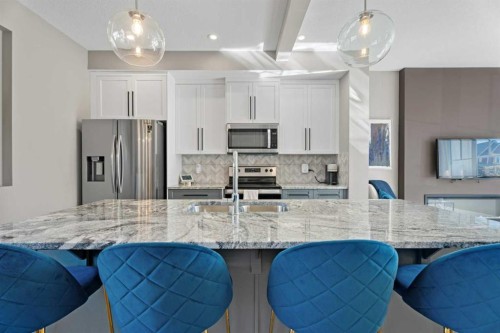 332 Lawthorn Way Se, Airdrie, AB - Indoor Photo Showing Kitchen With Double Sink With Upgraded Kitchen