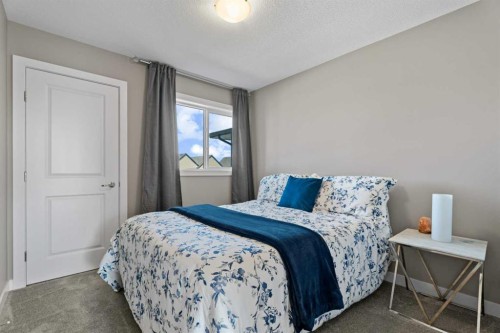 332 Lawthorn Way Se, Airdrie, AB - Indoor Photo Showing Bedroom