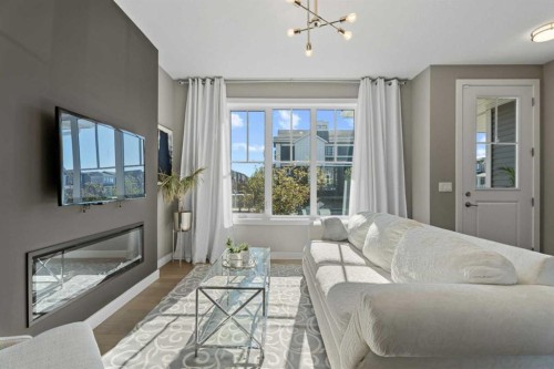 332 Lawthorn Way Se, Airdrie, AB - Indoor Photo Showing Living Room With Fireplace