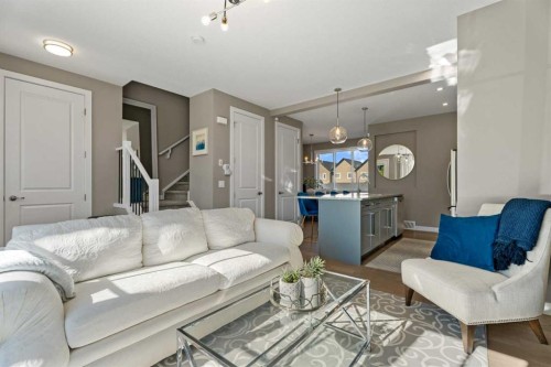 332 Lawthorn Way Se, Airdrie, AB - Indoor Photo Showing Living Room