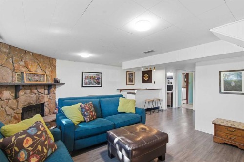 83 Brazeau Crescent Sw, Calgary, AB - Indoor Photo Showing Living Room With Fireplace