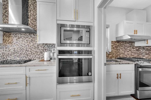 127 Ambleside Crescent Nw, Calgary, AB - Indoor Photo Showing Kitchen With Upgraded Kitchen