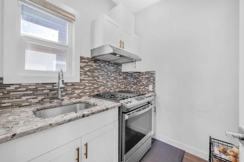 127 Ambleside Crescent Nw, Calgary, AB - Indoor Photo Showing Kitchen With Upgraded Kitchen