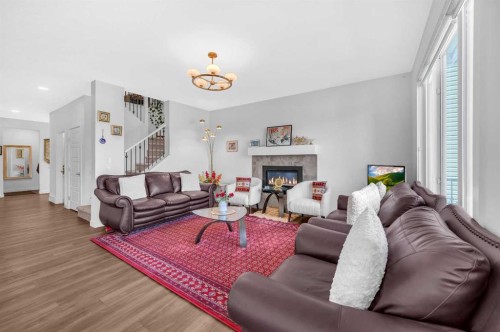 127 Ambleside Crescent Nw, Calgary, AB - Indoor Photo Showing Living Room With Fireplace