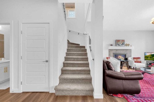 127 Ambleside Crescent Nw, Calgary, AB - Indoor Photo Showing Other Room With Fireplace