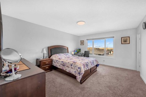 127 Ambleside Crescent Nw, Calgary, AB - Indoor Photo Showing Bedroom