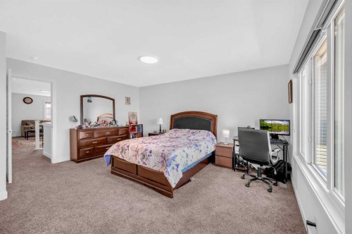 127 Ambleside Crescent Nw, Calgary, AB - Indoor Photo Showing Bedroom