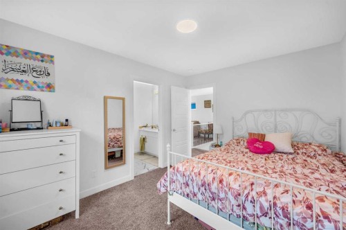 127 Ambleside Crescent Nw, Calgary, AB - Indoor Photo Showing Bedroom