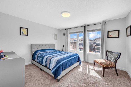 127 Ambleside Crescent Nw, Calgary, AB - Indoor Photo Showing Bedroom