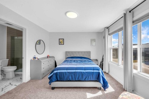 127 Ambleside Crescent Nw, Calgary, AB - Indoor Photo Showing Bedroom