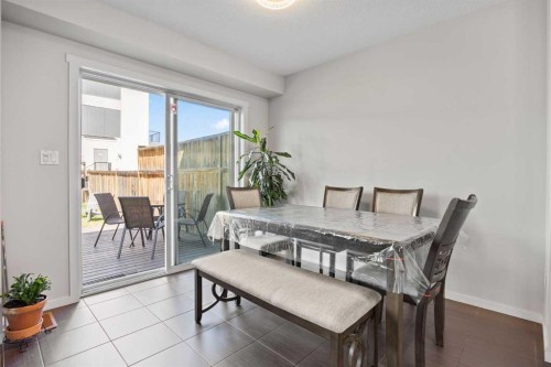 180 Panatella Way Nw, Calgary, AB - Indoor Photo Showing Dining Room