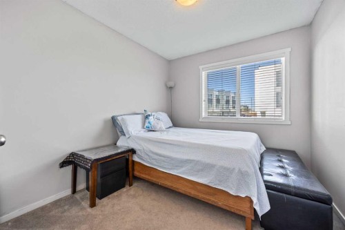 180 Panatella Way Nw, Calgary, AB - Indoor Photo Showing Bedroom