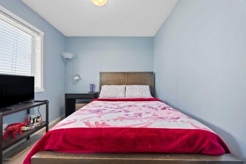 180 Panatella Way Nw, Calgary, AB - Indoor Photo Showing Bedroom