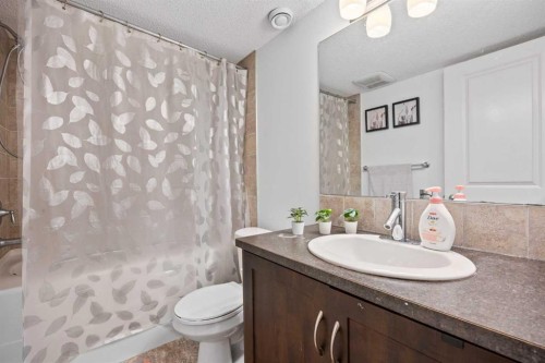 180 Panatella Way Nw, Calgary, AB - Indoor Photo Showing Bathroom
