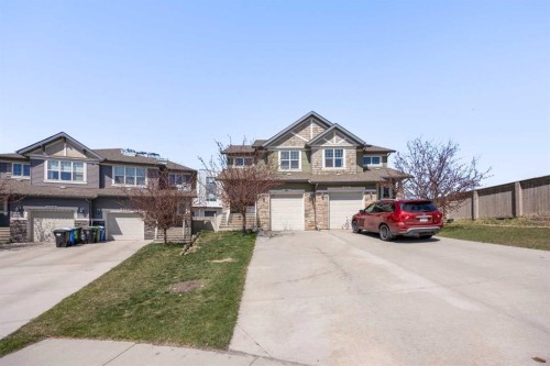 180 Panatella Way Nw, Calgary, AB - Outdoor With Facade