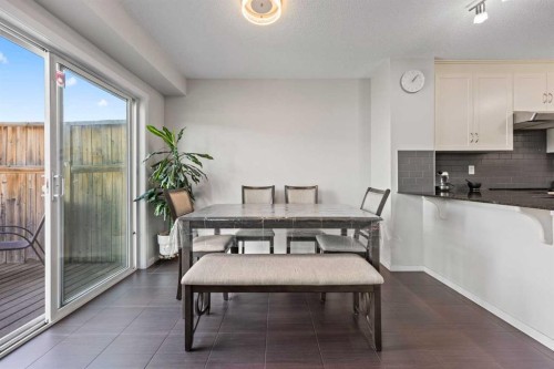 180 Panatella Way Nw, Calgary, AB - Indoor Photo Showing Dining Room