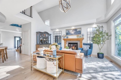 47 Cranleigh Green Se, Calgary, AB - Indoor Photo Showing Living Room With Fireplace