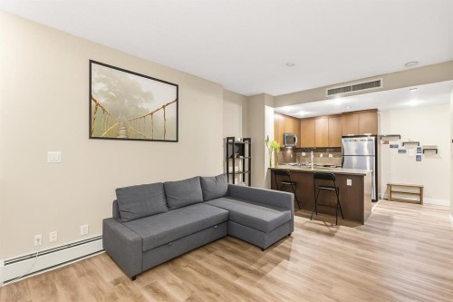 1403-99 Spruce Place Sw, Calgary, AB - Indoor Photo Showing Living Room