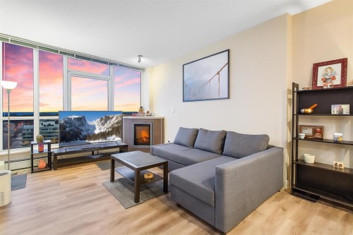 1403-99 Spruce Place Sw, Calgary, AB - Indoor Photo Showing Living Room