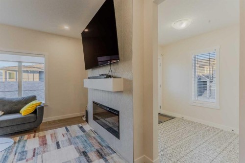 169 Verity Manor Sw, Calgary, AB - Indoor With Fireplace