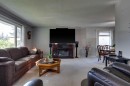 360 Malvern Close Ne, Calgary, AB  - Indoor Photo Showing Living Room 