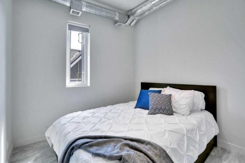 405-624 8 Avenue Se, Calgary, AB - Indoor Photo Showing Bedroom