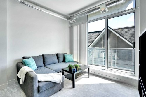 405-624 8 Avenue Se, Calgary, AB - Indoor Photo Showing Living Room