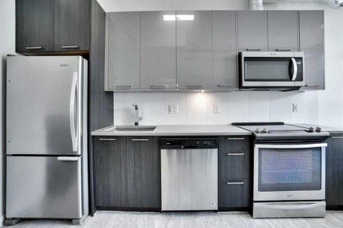 405-624 8 Avenue Se, Calgary, AB - Indoor Photo Showing Kitchen With Stainless Steel Kitchen With Upgraded Kitchen